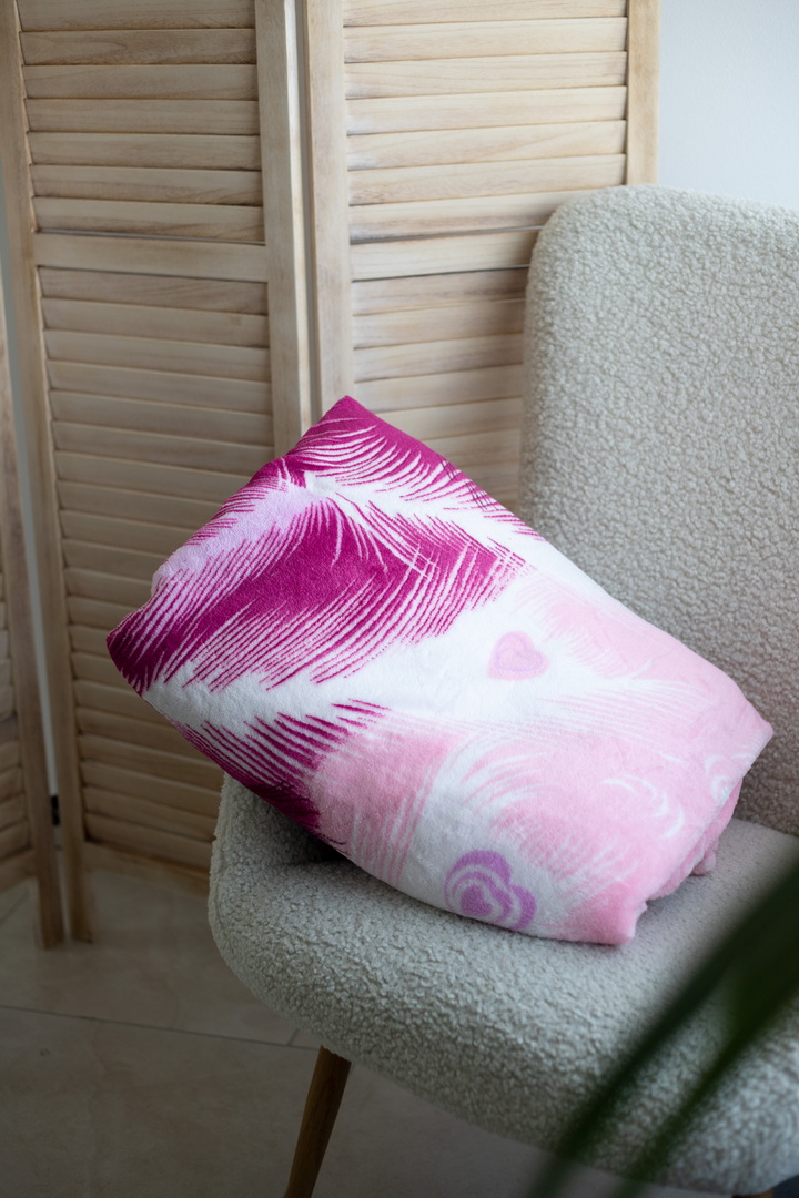 Пледи та покривала